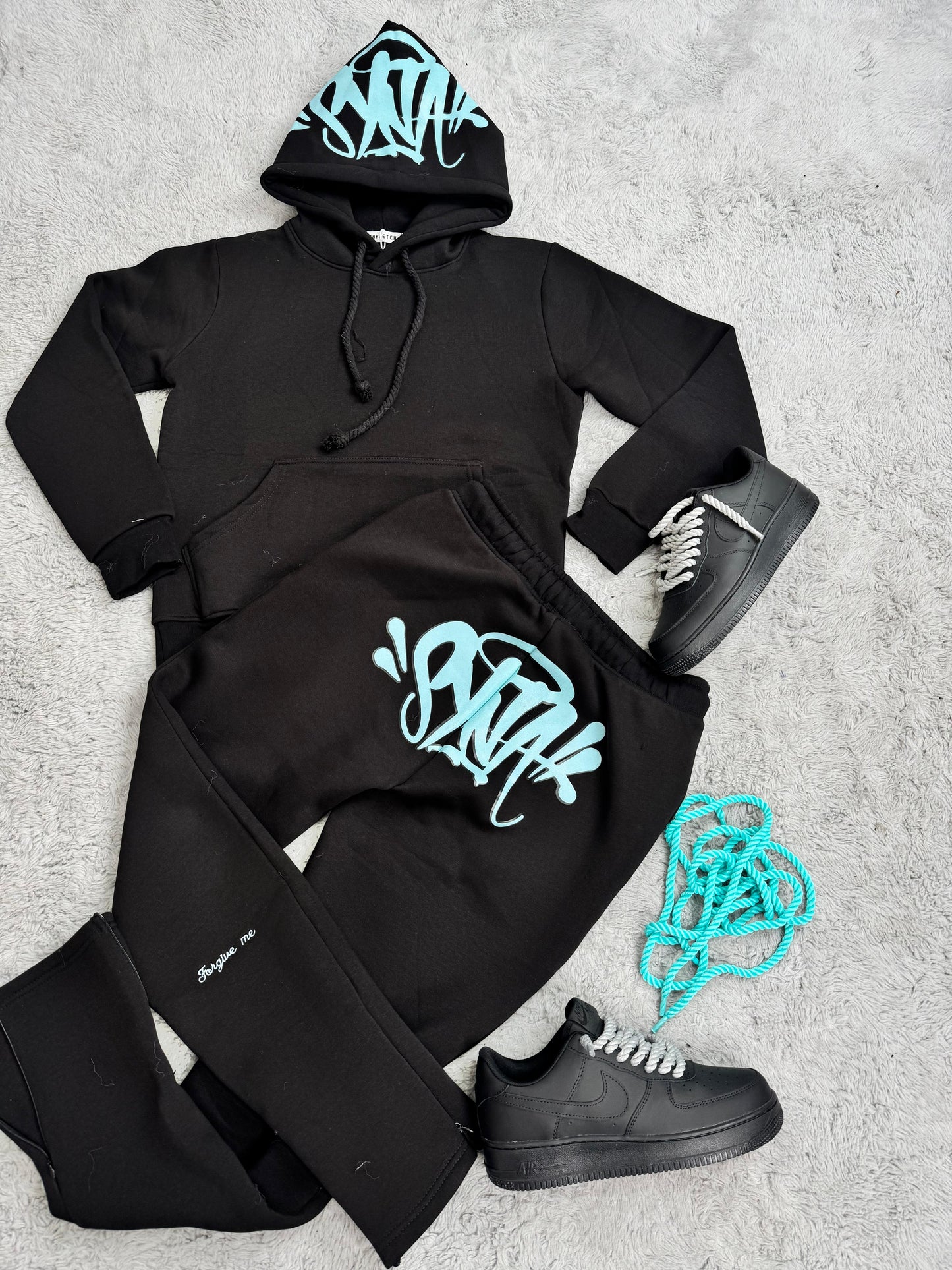 Chandal SynaWorld Negro/Azul 2025